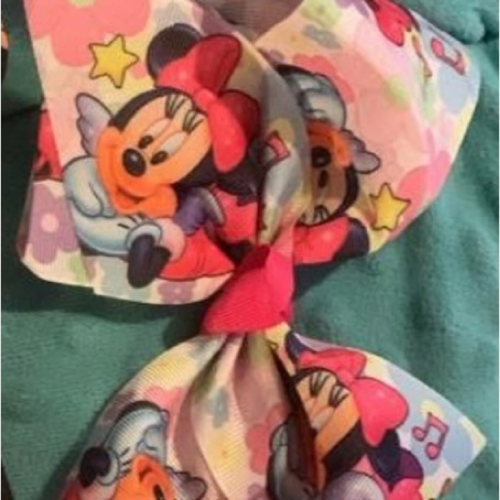 Playful Red and Pink Hair Bow with Mickey Mouse Design